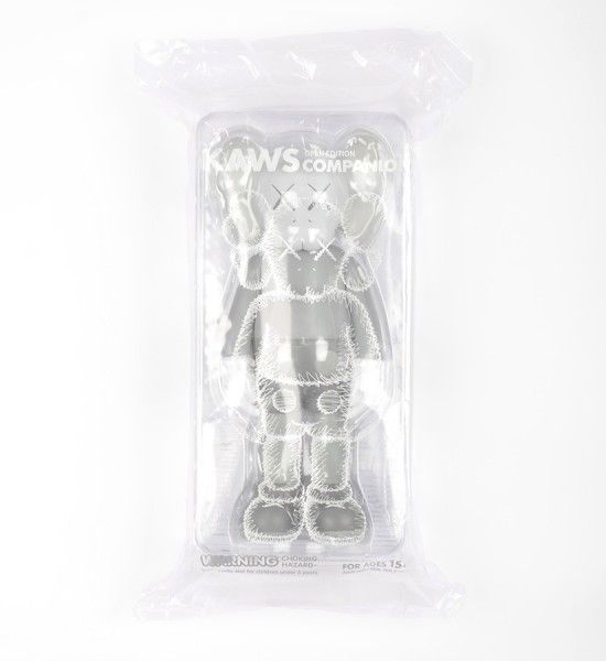 Entitled "Companion (Grey)", this art toys by Kaws is an open edition. Made in 2016, format is 10,6 x 4,3 inches (27 x 11 cm). The work is sold in its original box.
